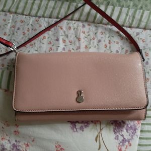 CROSS BODY WALLET WITH LONG SHOLDER STRAP. (ON OR